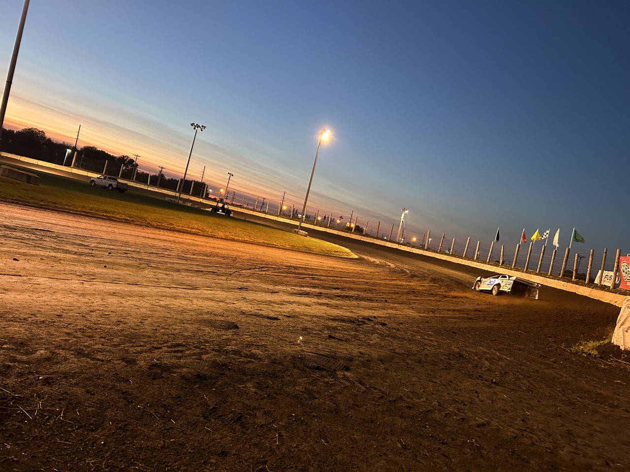 A DIRTcar Late Model drives into a turn at Lincoln Speedway at the DIRTcar Fall Nationals