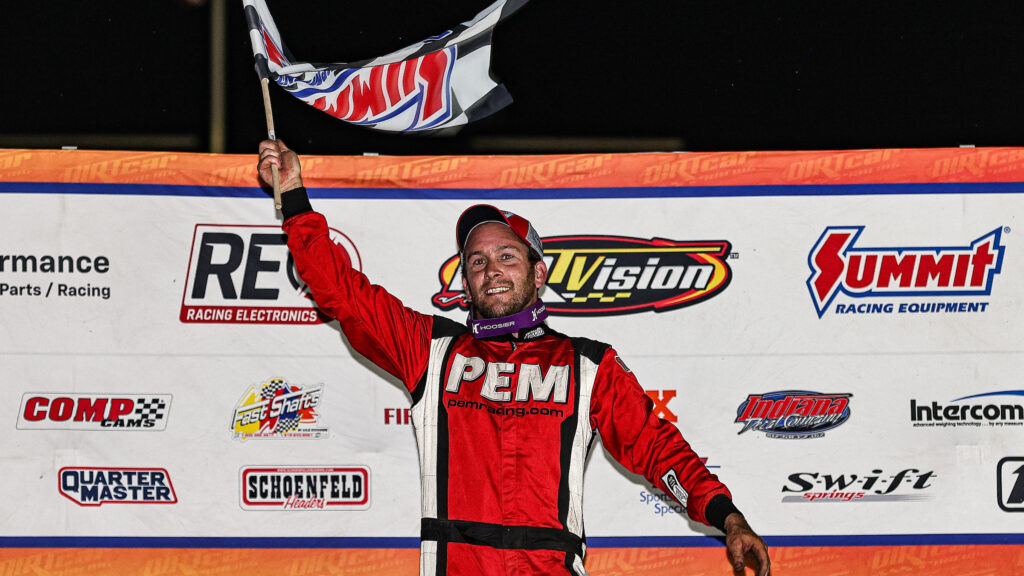 DIRTcar UMP Modified driver Michael Long celebrating in Victory Lane