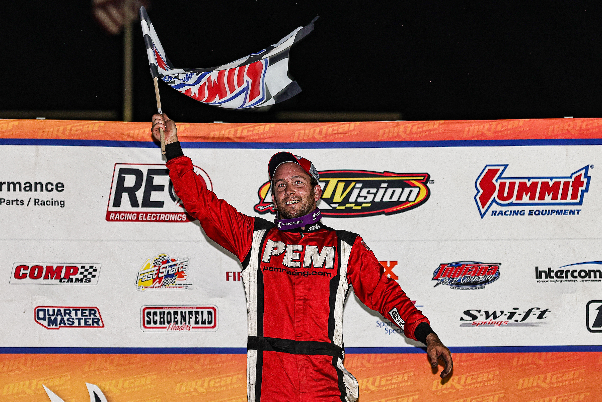 DIRTcar UMP Modified driver Michael Long celebrating in Victory Lane