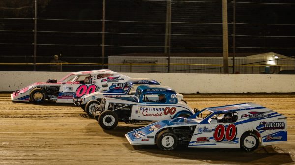 Buzzie Reutimann and David Reutimann driving their DIRTcar UMP Modifieds around Volusia Speedway Park before the start of the 2022 Reutimann Memorial main event