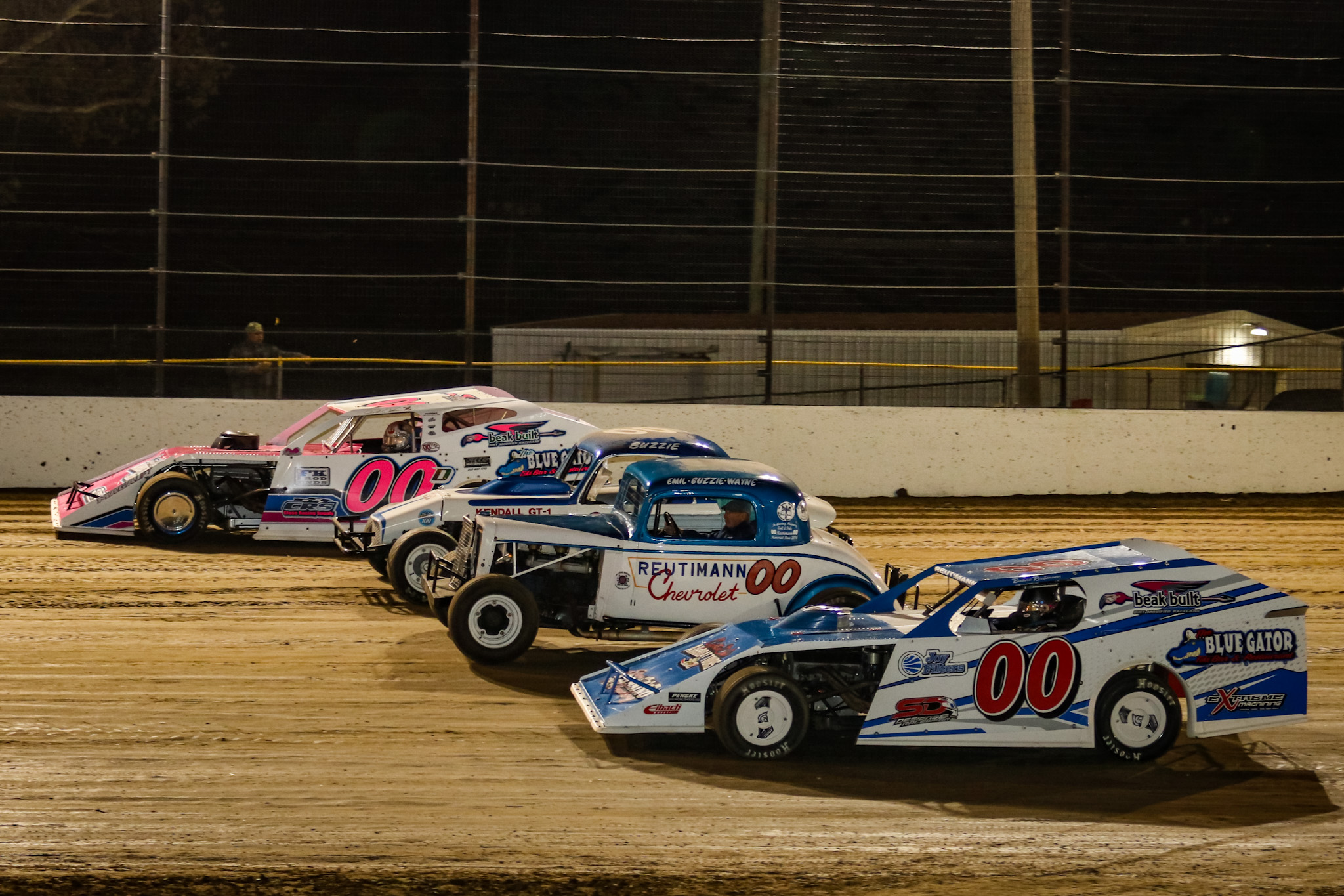 Buzzie Reutimann and David Reutimann driving their DIRTcar UMP Modifieds around Volusia Speedway Park before the start of the 2022 Reutimann Memorial main event