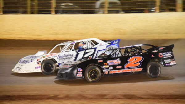 Rod Tucker races next to Bradley Weaver