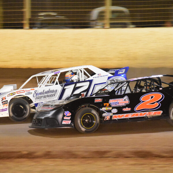 Rod Tucker races next to Bradley Weaver