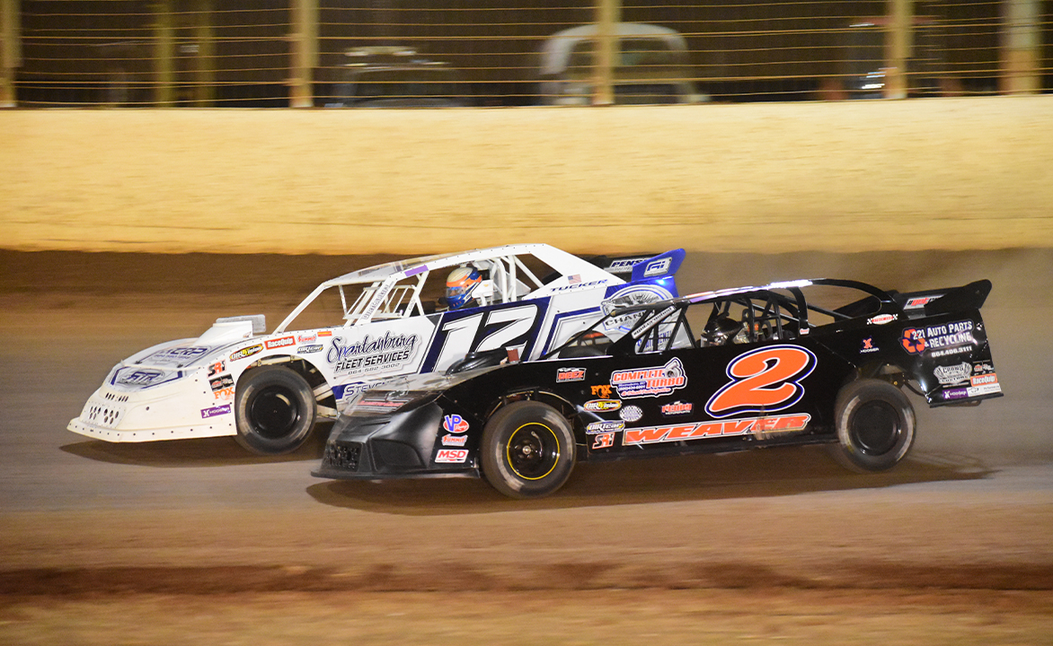 Rod Tucker races next to Bradley Weaver